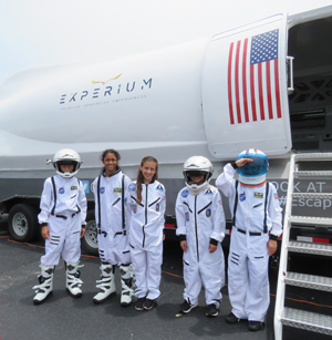 Rocket girls, and rocket guys: Students from St. Ambrose School are dressed and ready to go as astronauts on the Experium Space Colony Mission. May 7 and 8, the STEM (Science, Technology, Engineering and Math)-like escape room and simulator gave students the opportunity to fly to Mars and solve missions on the red planet.