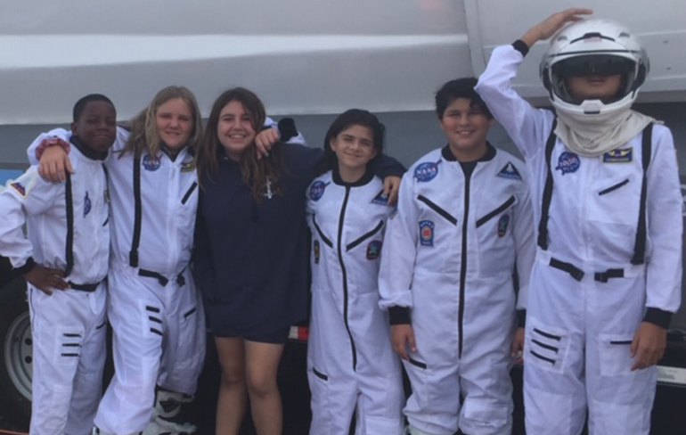 Astronaut couture: Students from St. Ambrose School are dressed and ready to go as astronauts on the Experium Space Colony Mission. May 7 and 8,  the STEM (Science, Technology, Engineering and Math)-like escape room and simulator gave students the opportunity to fly to Mars and solve missions on the red planet.