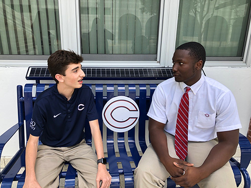 Harrison Dunbar, left, and Jeramy Passmore discuss what they learned from speakers at Christopher Columbus High School's new lecture series marking Black History Month.