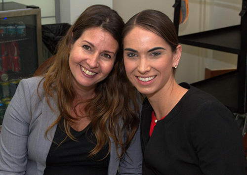 Science teacher Natalia Romero, left, and theology teacher Jane Curry served as co-directors of TEDx, a recent forum of speeches and performances at St. Thomas Aquinas High School in Fort Lauderdale.