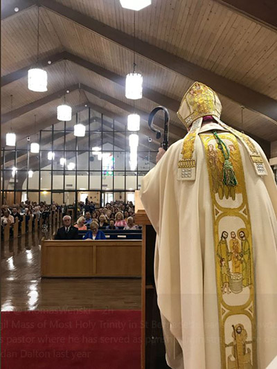 Archbishop Thomas Wenski preaches the homily during the Mass where he installed Father Bryan Garcia as pastor of St. Bernadette Parish in Hollywood, June 15, 2019.