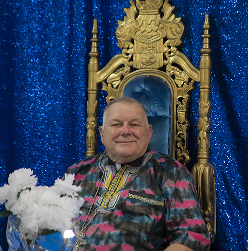 Archbishop Thomas Wenski, dressed in a traditional Nigerian shirt, attends the reception held after the 25th anniversary Mass for the Nigerian Apostolate, June 16, 2019 at St. Monica Church, Miami Gardens.