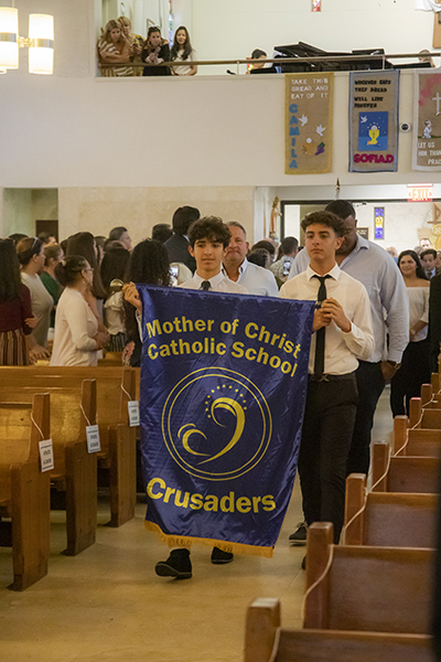 Students from Mother of Christ School process into St. Agnes Church, Key Biscayne, for the All Catholic Conference All Star Mass.