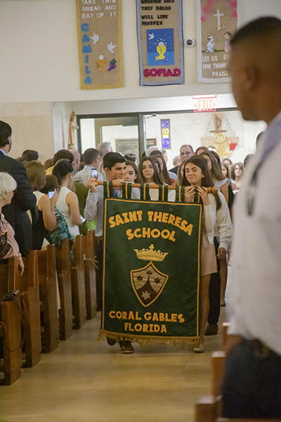 Students from St. Theresa School process into St. Agnes Church, Key Biscayne, for the All Catholic Conference All Star Mass.