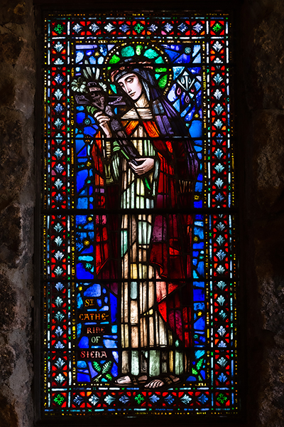A stained glass window depicting Our Lady is situated in the rear of the Chapel on the Rock (formally named St. Catherine of Siena Chapel) in Allenspark, Colorado, near Estes Park. The window was created in Munich, Germany, in 1938.