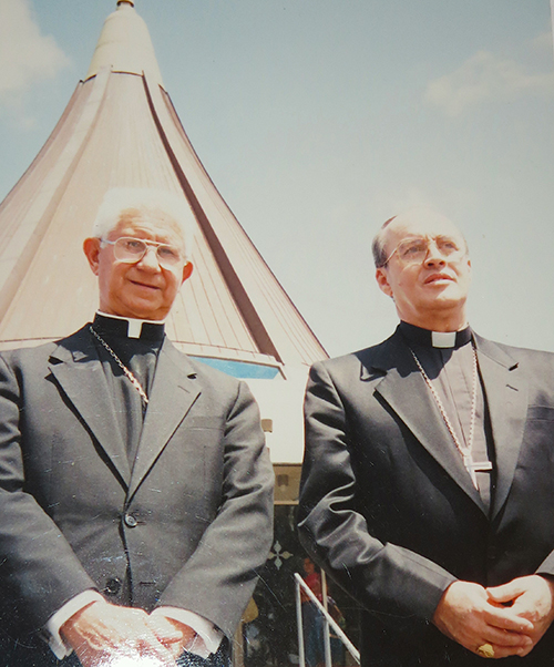 File photo of Cardinal Jaime Ortega, left, with Miami Auxiliary Bishop Agustín Román during the cardinal's visit to Miami in 1995.