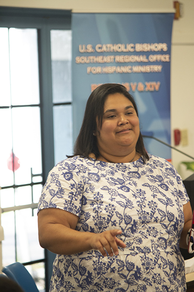 Maria Alejandra Rivas, digital media specialist for the Archdiocese of Miami communications office, tells participants at the Young Latino Summer Leadership Institute to "be influencers for Christ" on their social media platforms. The institute took place July 20-26 at SEPI (Southeast Pastoral Institute).