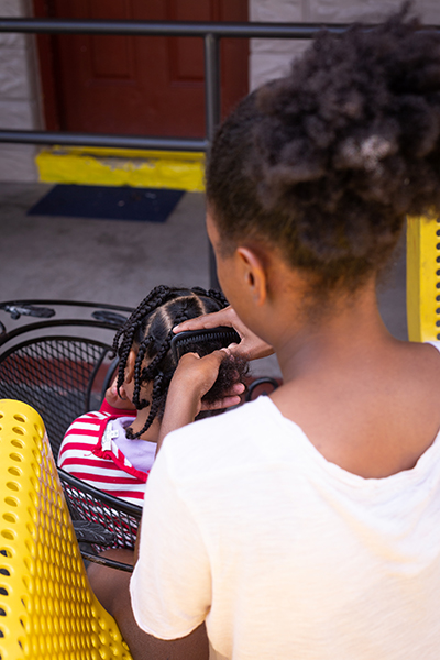 Children relax on a quiet weekend at New Life Family Center, a Catholic Charities emergency shelter serving homeless families in Miami-Dade County. The families are provided the services they need to move into permanent independent living and self-sufficiency.