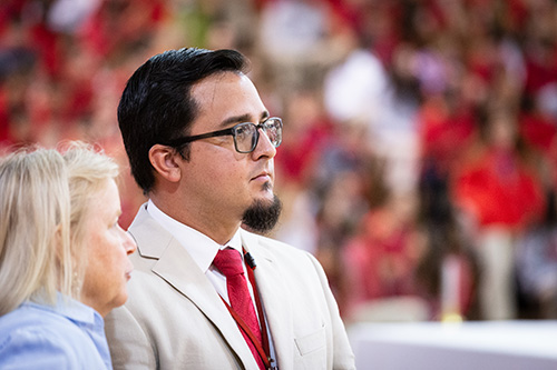 Oscar Cedeño, principal of Cardinal Gibbons High School in Fort Lauderdale, is shown before the start of a Mass for the opening of the new school year Aug. 22. Archbishop Thomas Wenski president at the liturgy at the school's campus.