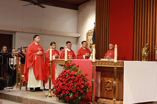 Archbishop Thomas Wenski presided at the Mass marking the opening of the academic year at the University of Miami. Priests concelebrating the Mass included, from left: Father Rafael Capo, of the Southeast Regional Office for Hispanics and Pastoral Juvenil Hispana; Father Elvis Gonzalez, archdiocesan director of vocations; Father Phillip Tran, Catholic chaplain at UM; Father Richard Vigoa, administrator of St. Augustine Church; and Jesuit Bishop Luis del Castillo, retired of Melo, Uruguay. The Mass took place at St. Augustine Church and Catholic Student Center, just across from the UM campus, Sept. 15, 2019.