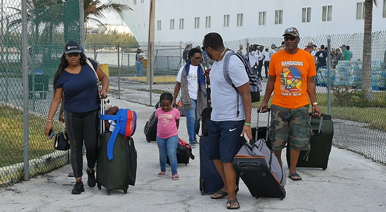 Some of the 200 Bahamian residents stranded in South Florida during Hurricane Dorian arrive in Freeport Sept. 6. Bahamas Paradise Cruise Line's Grand Celebration ferried them back on a humanitarian mission that also brought more than 1,100 evacuated Bahamian and American residents to the Port of Palm Beach Sept. 7.