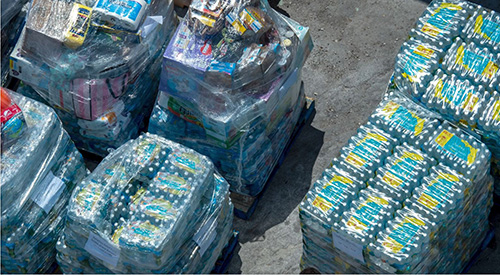 Pallets of water bottles were among the more than 225,000 pounds of supplies delivered to Freeport, Bahamas, by Bahamas Paradise Cruise Line's Grand Celebration. The ship sailed from Palm Beach the evening of Sept. 5 and returned Sept. 7 with more than 1,100 evacuees, fleeing from the ravages of Hurricane Dorian.