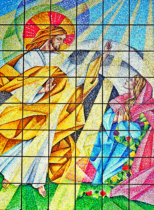 The risen Jesus appears to Mary Magdalene in this mosaic at the Lakeside Chapel, part of Our Lady of Mercy Cemetery in Doral.