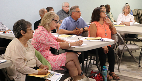 Participants listen to Rose Allen, bioethics program director for Baptist Health South Florida in Miami, as she presents A Catholic Conversation about Advance Health Care Planning at St. Coleman Parish in Pompano Beach Sept. 13.
