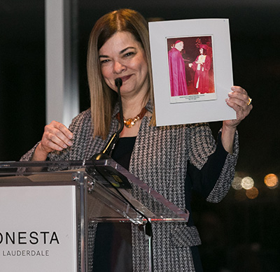 Justice Barbara Lagoa, President Trump's nominee to the U.S. Court of Appeals for the 11th Circuit of Florida and currently a member of the Florida Supreme Court, holds up a picture of Miami's second archbishop, Edward McCarthy, presenting her with her high school diploma.