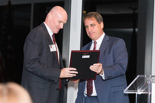 Judge Edward Merrigan, left, 17th Judicial Circuit Court of Florida and Brigadier General, U.S. Army Reserve, receives the St. Thomas More Society's annual Archbishop Edward A. McCarthy Award from Chief Judge Jack Tuter of the 17th Judicial Circuit of Florida.