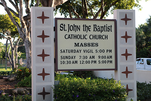 A sign welcomes worshipers to St. John the Baptist Church located in the northeast corner of Fort Lauderdale.