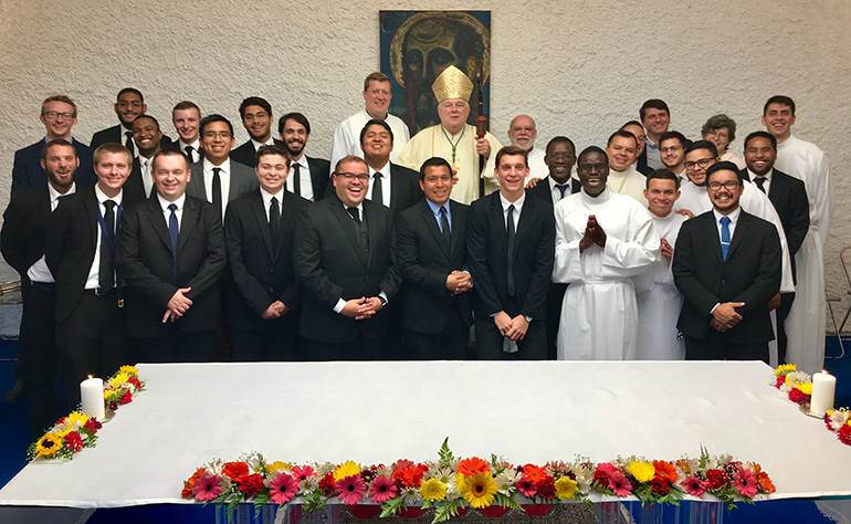 Archbishop Thomas Wenski with seminarians from Redemptoris Mater Seminary in Hialeah, after celebrating Mass with them Oct. 12, 2019.