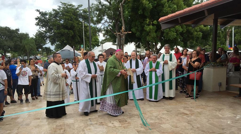 After celebrating a multilingual Mass (Spanish, Brazilian Portuguese, and English) Oct. 20 at St. Vincent Church in Margate, Archbishop Thomas Wenski blesses a new pavilion at the parish.