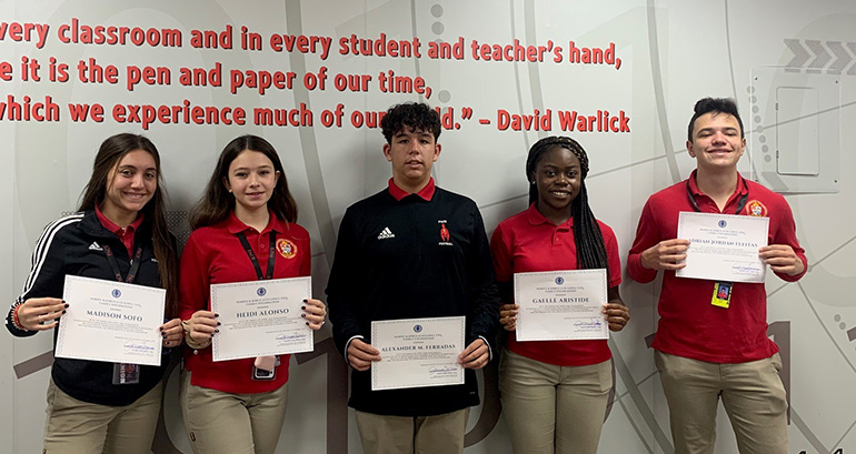 From left, the five recipients of this year's Jorge Luis Lopez Esq. Scholarship at Msgr. Edward Pace High School: Madison Sofo, Heidi Alonso, Alexander M. Ferradas, Gaelle Aristide, and Adrian Jordan Fleitas.