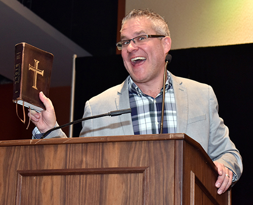 Bible teacher Mark Hart mugs for the camera during one of his talks at the Catechetical Conference in Miami.