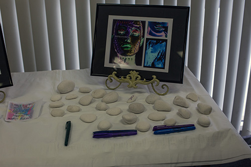 Leave no stone unturned, a representation of stones that victims of human trafficking use during therapy sessions with Susan Buzzi. A victim advocate, educator and retired police officer, she spoke at a domestic violence presentation at St. Thomas University Oct. 17, 2019.