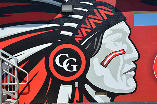 A close up shot of the chief element of the Chief mural, designed by renowned marine-life artist and Cardinal Gibbons alumnus Dennis Friel '92, that was installed on the south side of the high school's baseball dugout in honor of the Gunther family.