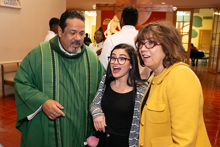 Chatting before the start of the 60th anniversary Mass, from left: St. Elizabeth of Hungary pastor Father Harry Loubriel, Lauren Cussell, a former school student, and Alicia McDermott, parish manager and a longtime parishioner.

Archbishop Thomas Wenski celebrated the Mass marking the 60th anniversary of St. Elizabeth of Hungary parish, Pompano Beach, Nov. 17, 2019.