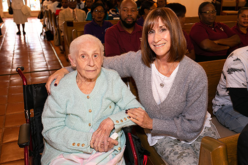 Helen Rutkowski, left, is a Hungarian-born resident of Deerfield Beach and member of St. Elizabeth of Hungary parish since 1964. With her is her daughter, Theresa Cussell of Deerfield Beach. Archbishop Thomas Wenski celebrated the Mass marking the 60th anniversary of St. Elizabeth of Hungary parish, Pompano Beach, Nov. 17, 2019.