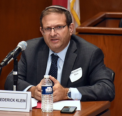 Rabbi Frederick L. Klein, executive vice president of the Rabbinical Association of Greater Miami, takes part in a panel discussion on Vatican-Israel relations at St. Thomas University. The event honored the 25th anniversary of the Holy See's recognition of the Jewish state.