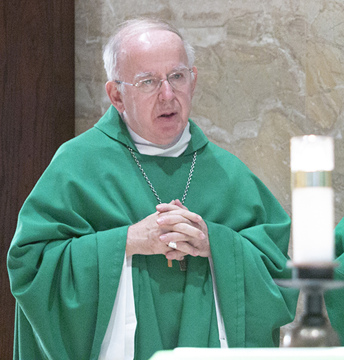 Bishop Marc Stenger of Troyes, France, representing the French bishops' conference, prays during the Mass celebrated at the Pastoral Center during the meeting of PROCHE representatives in Miami, Oct. 29, 2019. He is also co-president of Pax Christi International.