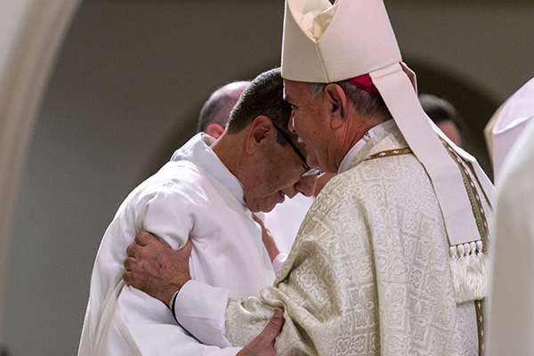 At the conclusion of the ordination rite, Bishop Fernando Isern gives a "fraternal kiss" to his cousin, Deacon Jorge Matamala.




Archbishop Thomas Wenski ordained nine more permanent deacons for the Archdiocese of Miami at St. Mary Cathedral, Dec. 14, 2019.