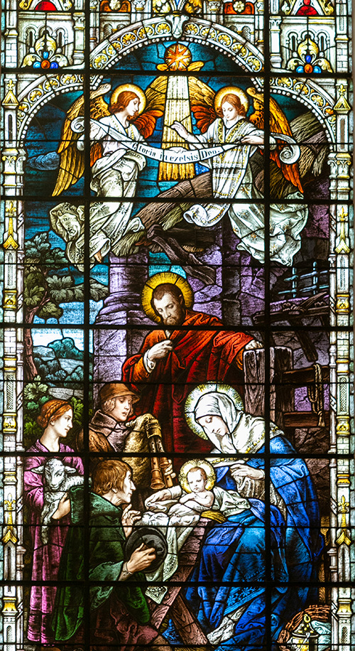 Stained glass image of the Nativity at Gesu Church in downtown Miami. Cover of December 2019 edition of Florida Catholic, Miami.