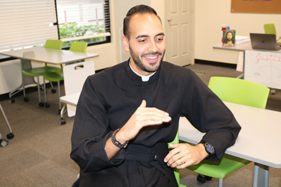 Piarist Father Ricardo Rivera talks to the Florida Catholic.