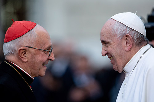 Pope Francis greets Cardinal Fernando Filoni, newly appointed Grand Master of the Equestrian Order of the Holy Sepulchre, during his visit to Rome’s Piazza di Spagna to venerate the statue of the Immaculate Conception overlooking the Spanish Steps on Dec. 8, 2019.