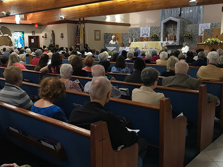 Archbishop Thomas Wenski preaches the homily at the Mass marking the conclusion of St. Henry Parish's year-long celebration of its 50th anniversary, Jan. 11, 2020.