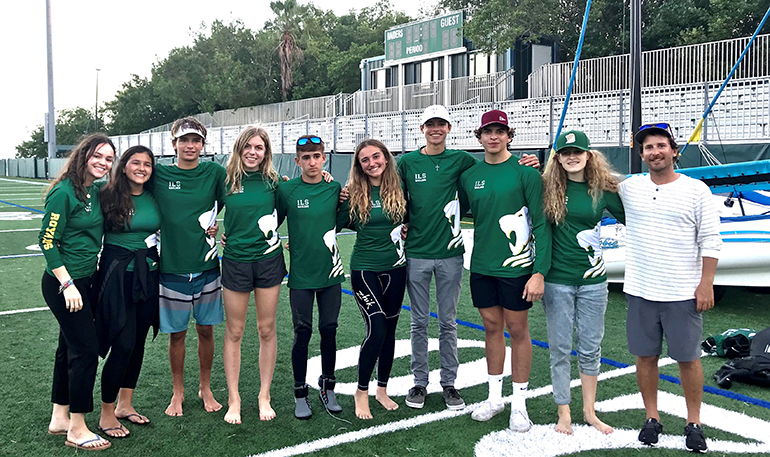 Members of Immaculata-La Salle's sailing team pose with their coach Lior Lavie during a break in the Ransom Everglades South Points #4 regatta, Jan. 11-12, 2020.
