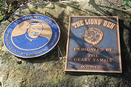 A plaque dedicated to Msgr. Edmund Whyte lies outside St. Mark School's basketball court, accompanied by a plaque of the Geary family. In 1996, Msgr. Whyte was assigned to St. Mark and oversaw the construction of the church as well as Archbishop Edward McCarthy High School next door. He simultaneously served as its supervising principal from 1996 to 2004.