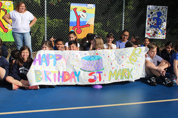Students wish St. Mark School a happy birthday during the first pep rally in the school's history on Jan. 24, 2020. The celebration coincided with the school's 25th anniversary, and also kicked off Catholic Schools Week.