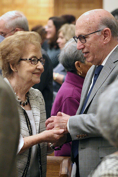 As on the day of their wedding, couples hold hands and face each other as they renew their marriage vows at the wedding anniversary Mass celebrated at St. Mary Cathedral Jan. 25, 2020.