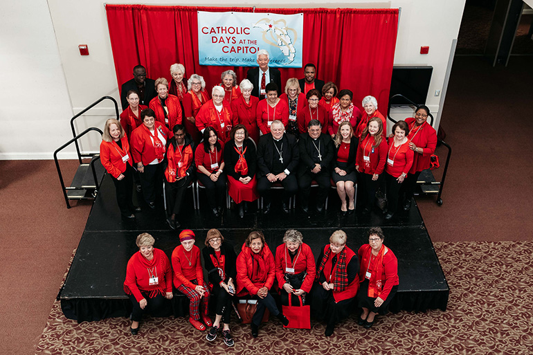 The Archdiocese of Miami delegation to Catholic Days at the Capitol, composed of members of the Miami Archdiocesan Council of Catholic Women as well as representatives of the Respect Life Office, pose for a photo with Archbishop Thomas Wenski and Auxiliary Bishop Enrique Delgado, Jan. 29, 2020.