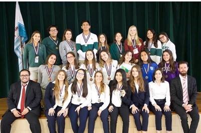 Members of Immaculata-La Salle's chapter of Health Occupations Students of America pose with their medals and their faculty moderators. 20 of them will represent the high school at the HOSA state competition April 2-5 in Orlando.