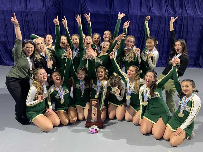 Immaculata-La Salle's Royal Lions rejoice after winning their first state title in competitive cheerleading Feb. 1, 2020. They won in the Class 1A extra-large non-tumbling division.