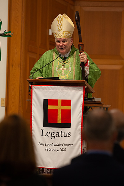 Archbishop Thomas Wenski preaches the homily during the chartering Mass for the Broward chapter of Legatus, Feb. 19, 2020, in St. Sebastian Church, Fort Lauderdale.