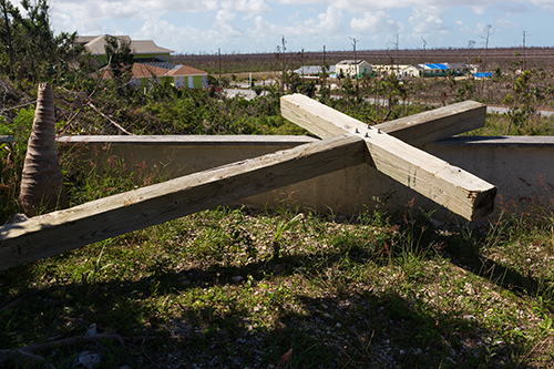 A cross remains felled at St. Francis de Sales Church in Abaco following last year's devastating Hurricane Dorian. The church is open for Mass every other week with a visiting member of The Bahamas clergy.