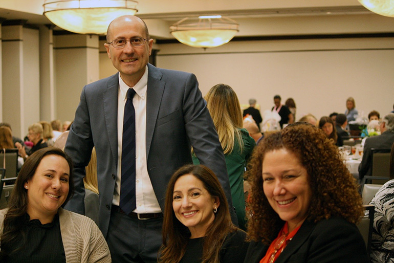 St. Brendan High School principal Jose "Pepe" Rodelgo-Bueno poses with staff members, from left: Katrina Ramos, director of Finance, Lilliam Kirschner-Sanchez, director of Guidance, and Ivette Alvarez, director of Counseling.