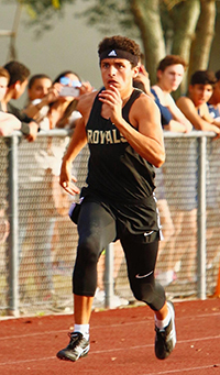 Immaculata-La Salle's Francis Coronado races toward 10th place out of 73 runners in the 200-meter dash at Belen Jesuit Prep's Home Meet March 3, 2020.