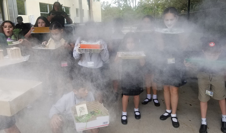 Sixth graders at Mary Help of Christians School recreated the conditions that made the Dust Bowl possible after reading a historical novel on that time period in American history.