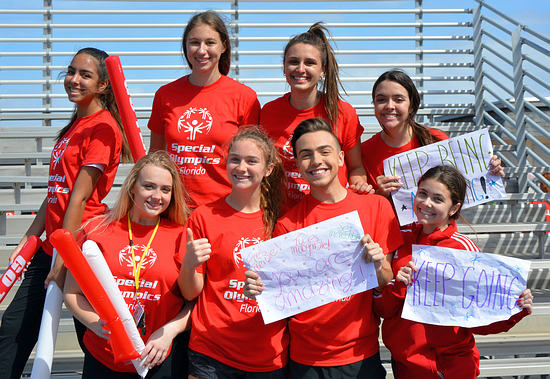 Cardinal Gibbons High School students cheer contestants March 7 at the Special Olympics Florida Broward County Games. This year, more than 70 students volunteered.