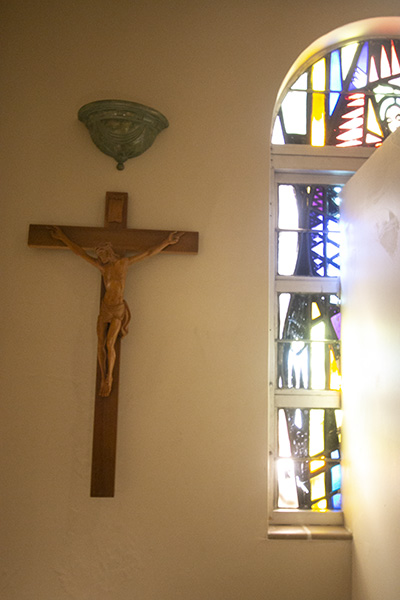 In-person confession is no longer possible because of the risk of spreading the coronavirus, but the Catechism of the Catholic Church specifies that, in those situations, an "act of perfect contrition" can substitute temporarily for the actual sacrament. Pictured: One of the confessionals at St. Mary Cathedral, lit for the taping of a Reconciliation Weekend promotional video, Feb. 27, 2019.